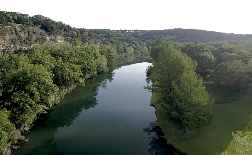 River in Hunt, Texas; surrounded by trees and greenery